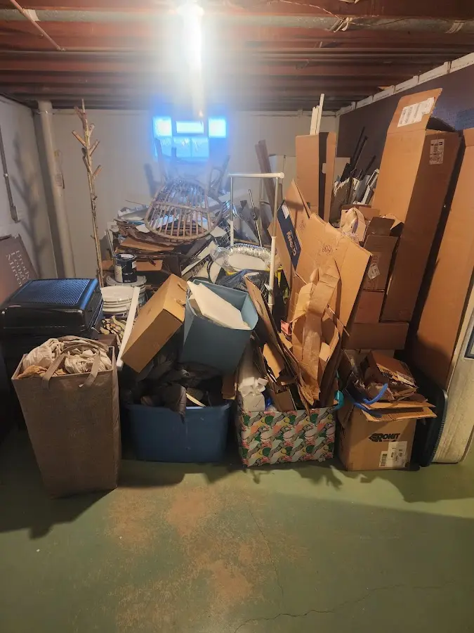 Roll-off dumpster container at job site for 2 Yard Dumpster Rental in Posen